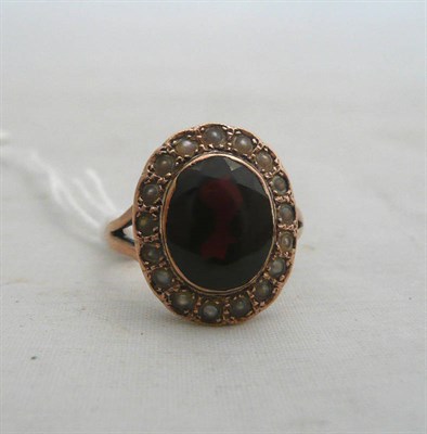 Lot 55 - Seed pearl and garnet ring, stamped 9ct
