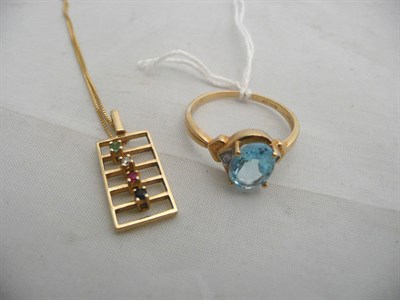 Lot 63 - Four coloured stone pendant and a pale blue stone ring