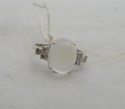 Lot 65 - A 14ct white gold moonstone and diamond ring