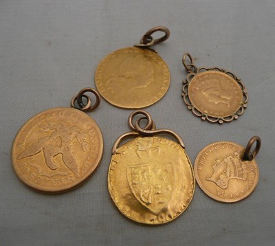 Lot 70 - Five gold mounted coins