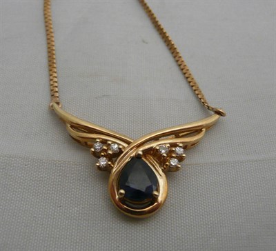 Lot 71 - A sapphire and diamond pendant