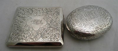 Lot 76 - A silver cigarette box and an oval silver snuff box
