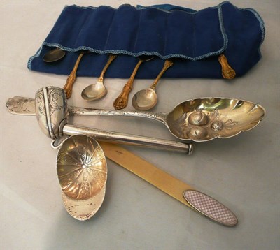 Lot 83 - A pipe, six teaspoons, berry spoon, caddy spoon and an enamel bookmark