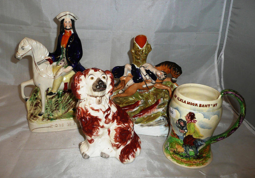Lot 140 - A Staffordshire spaniel, Staffordshire flatback vase, a figure 'Tom King' and a Crown Devon...