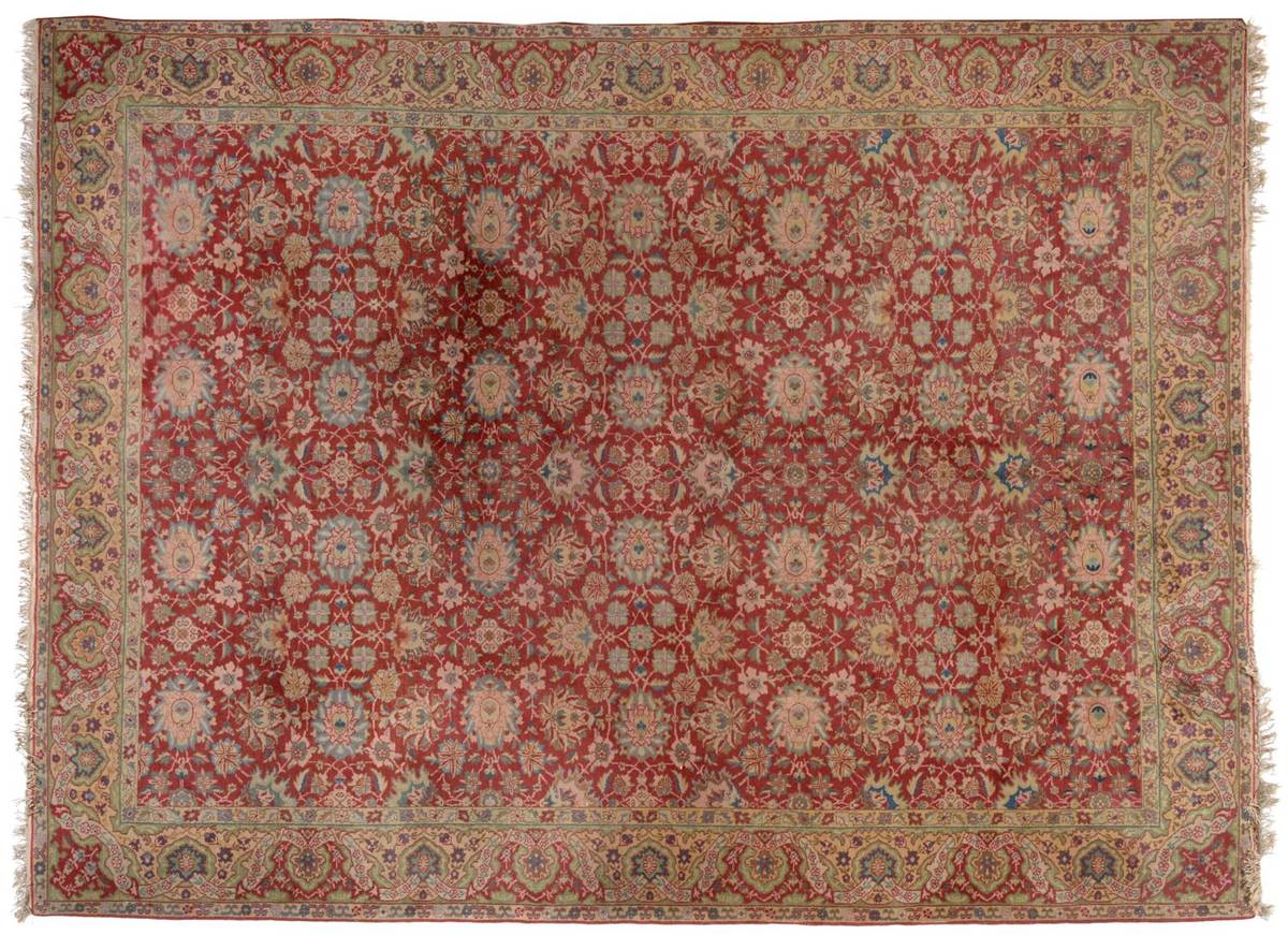 Lot 843 - Anatolian Carpet Probably Sivas The raspberry field with an allover design of columns of large...