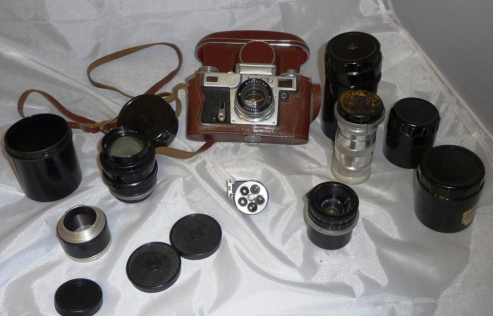 Lot 1113 - A Kiev IIIA Camera No.7517550, with Jupiter 8M f2/50mm lens, in a stitched leather, together...