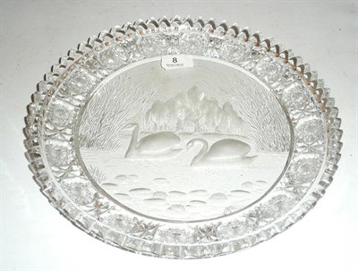 Lot 8 - A heavy cut glass dish decorated with two swans
