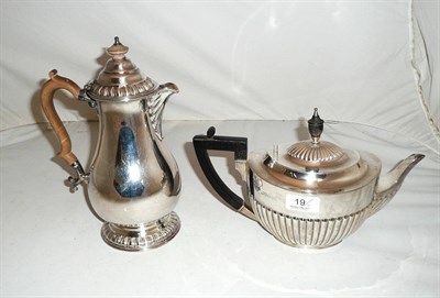 Lot 19 - Silver teapot and a plated hot water jug (2)
