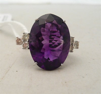Lot 89 - A 14ct white gold amethyst and diamond ring