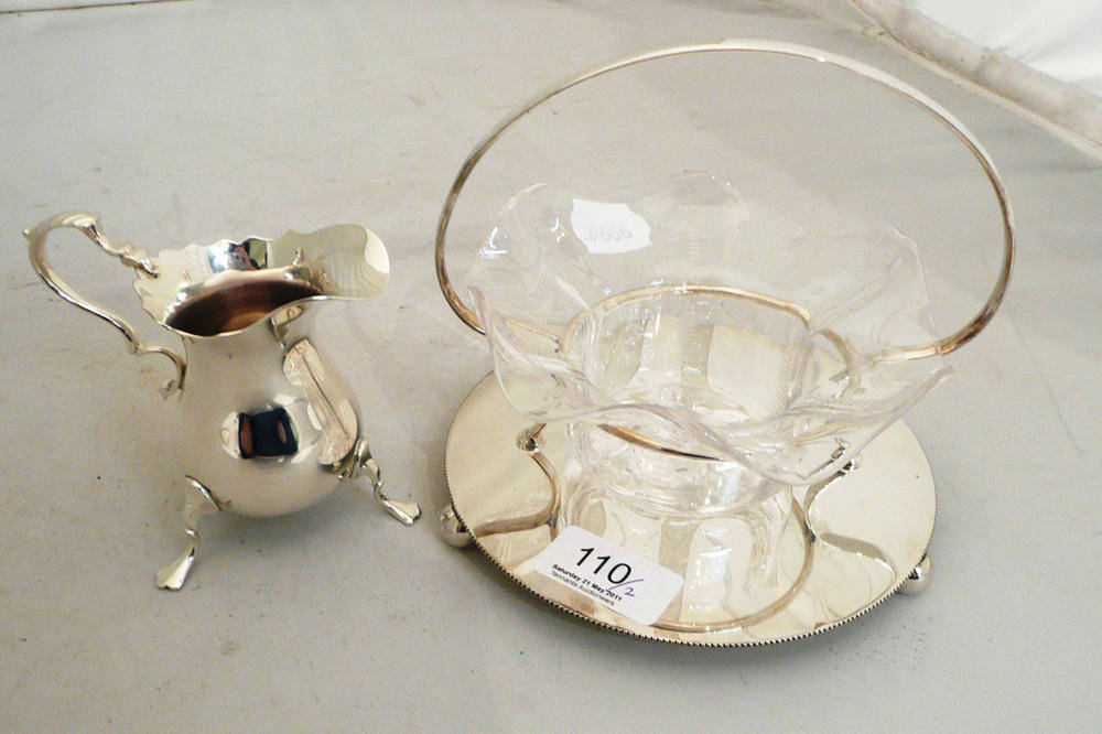 Lot 110 - Silver cream jug and plated stand with glass dish