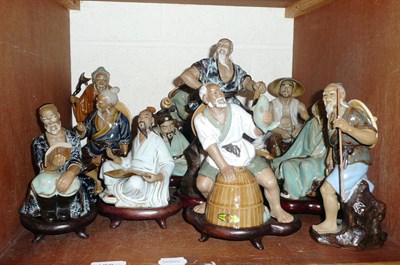 Lot 126 - Twelve Chinese pottery figures
