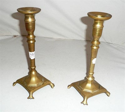 Lot 157 - Pair of brass candlesticks