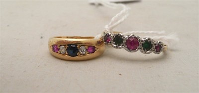 Lot 170 - An 18ct gold sapphire, diamond and ruby ring, and a five stone ring stamped '18CT' and 'PLAT'