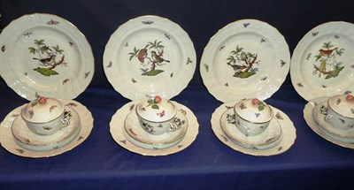Lot 187 - A Herend Porcelain eight setting dinner service in the Rothschilds Bird pattern, comprising...