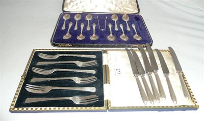 Lot 211 - Silver dessert forks, tea knives, teaspoons and tongs