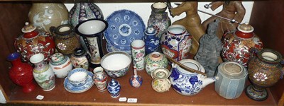 Lot 251 - Shelf of Oriental ceramics, including vases and figures