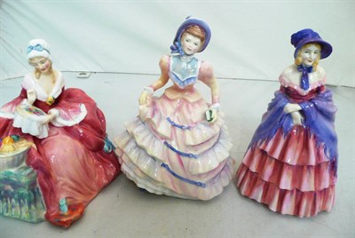 Lot 270 - Three Royal Doulton figures, a 'Victorian Lady' HN728, 'Hannah' HN3369 and 'Penelope' HN191