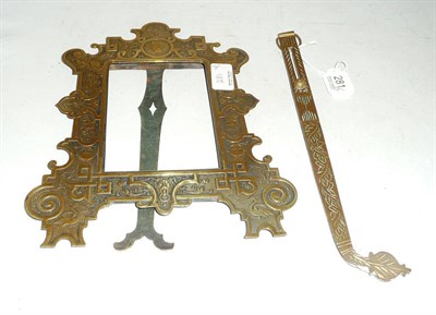 Lot 281 - Victorian metal decorative photo frame and a long brass Victorian holder