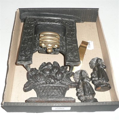 Lot 286 - Cast miniature fireplace with brass mount and three cast heart ornaments