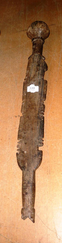 Lot 339 - A Tuareg, North Africa Wooden Tent Peg, with globular knop, the flattened irregular rectangular...