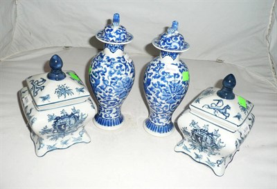 Lot 1 - A pair of Chinese blue and white vases with cover, four character marks to base and a pair of...
