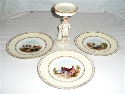 Lot 3 - Worcester centrepiece modelled as a boy under a tree and three Davenport plates
