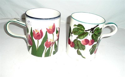 Lot 47 - Two large Wemyss mugs (one with chip to base, the other with restored handle)