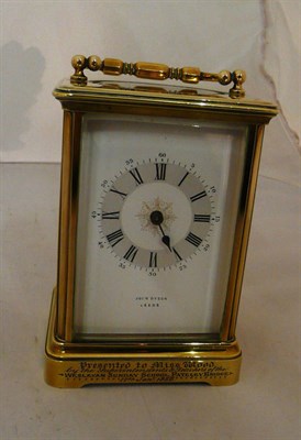 Lot 50 - A gilt brass carriage timepiece retailed by John Dyson, Leeds, with presentation inscription