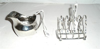Lot 53 - Georgian silver cream jug and a silver toast rack