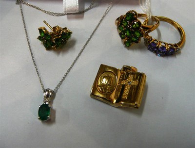Lot 66 - An emerald and diamond pendant on chain - each piece stamped '9K', a 9ct gold tanzanite and diamond