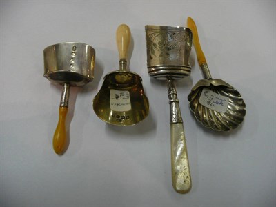 Lot 67 - A Georgian caddy shovel with scallop shaped bowl and turned ivory handle and three others (4)