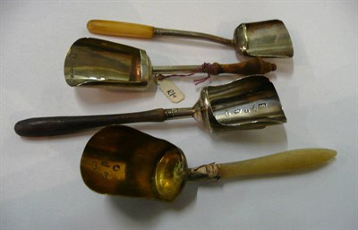 Lot 72 - Two silver caddy scoops with turned wooden handles and two others (4) (one handle a.f.)