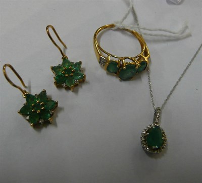 Lot 73 - A 9ct gold emerald and diamond ring, a pair of emerald cluster earrings stamped '9K' and an emerald
