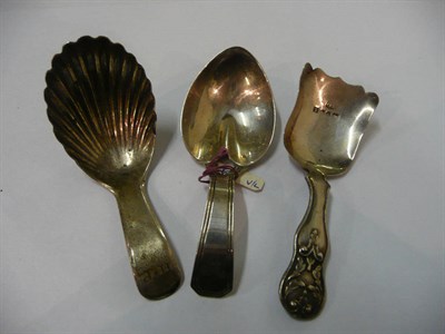 Lot 76 - Two Georgian silver caddy spoons, both JS, London, 1803 and 1802, also a Victorian example (3)