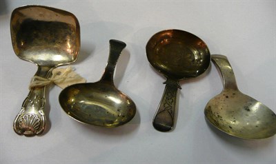 Lot 80 - Four Georgian silver caddy spoons, one with bright cut decoration, various makers, London,...