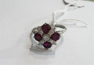 Lot 101 - A ruby and diamond cluster ring