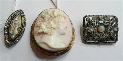 Lot 107 - A pink cameo brooch, a Continental opal and marcasite plaque brooch and a mourning brooch (a.f.)