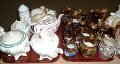 Lot 147 - Two trays of ceramics including copper lustre, tea pots, etc