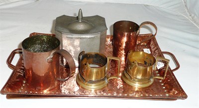 Lot 173 - Two Arts & Crafts copper trays, two copper mugs, pewter biscuit barrel, etc