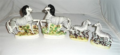 Lot 186 - Two pairs of Staffordshire zebras