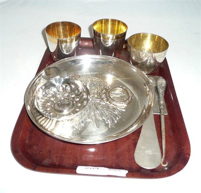 Lot 204 - A tray of white metal including a bowl, quaich, beakers etc