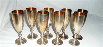 Lot 209 - A set of eight silver champagne goblets, 44oz approx