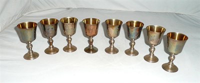 Lot 210 - A set of eight silver port goblets, 20oz approx