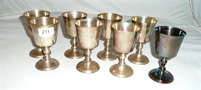 Lot 211 - A set of eight silver wine goblets, 37oz approx