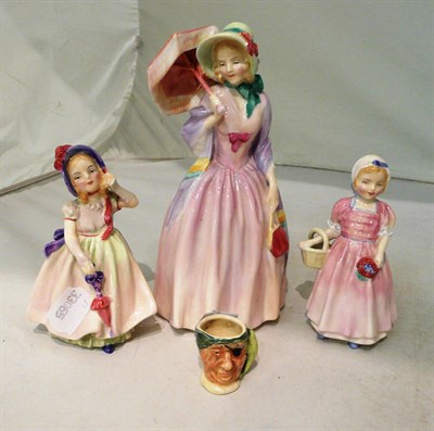 Lot 219 - Three Doulton figures 'Miss Demure' HN1402, 'Tinkle Bell' HN1677 and 'Babie' HN1679 and a miniature