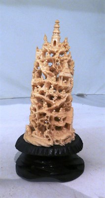 Lot 227 - Carved ivory model of figures climbing a tree