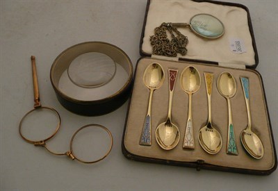 Lot 230 - Silver gilt teaspoons, lorgnettes, magnifier, etc