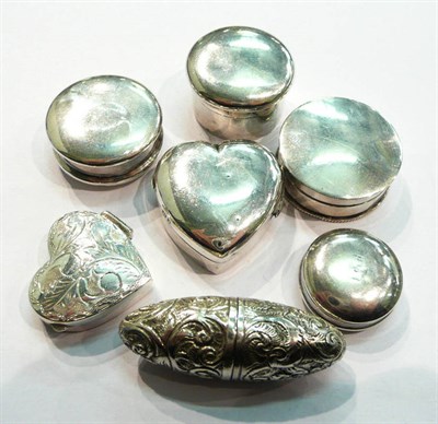 Lot 245 - Two silver heart shaped pill boxes, four silver circular patch boxes and a plated screw-apart...