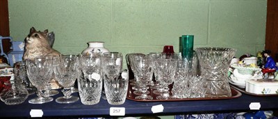 Lot 257 - A shelf including Royal Doulton cat and dog, Waterford cut glass and other glass and ceramics