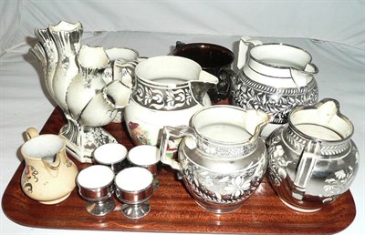 Lot 287 - A tray including, five silver lustre jugs, two handled pedestal cup, flower vase, four egg cups and